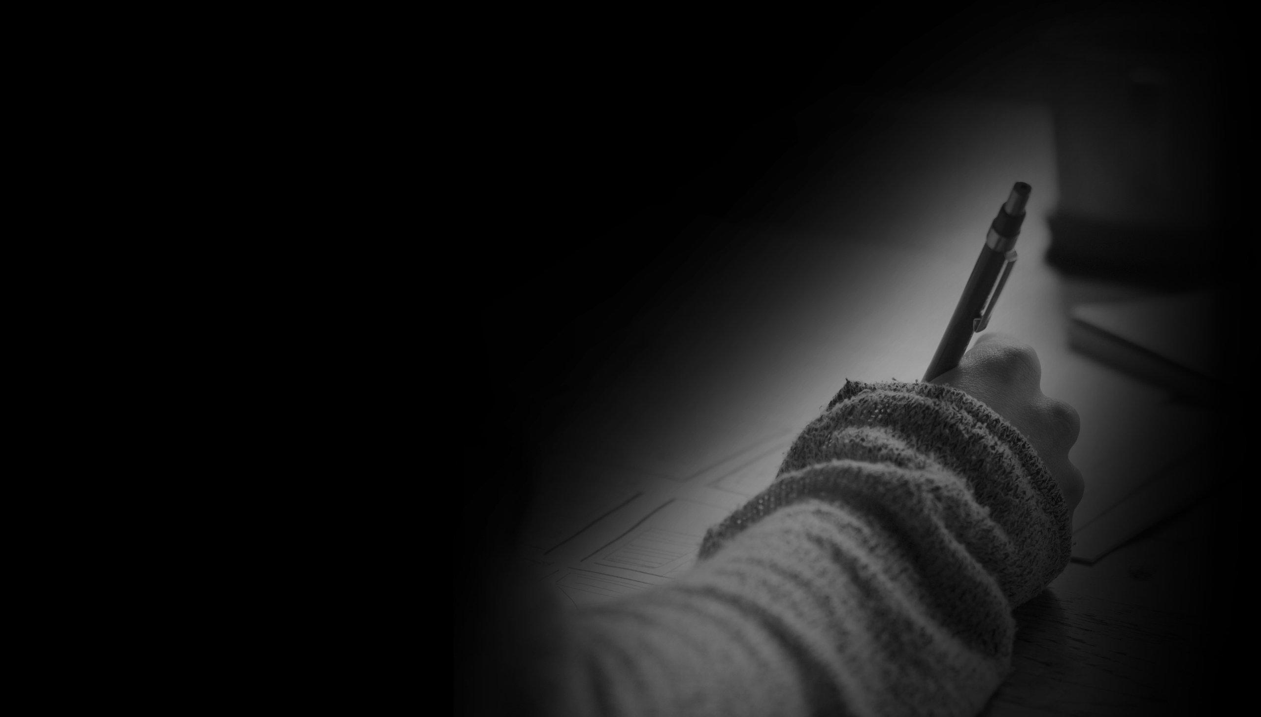 Agentur für Kommunikationsdesign zeigt ein Grafiktablett mit Hand und Stift